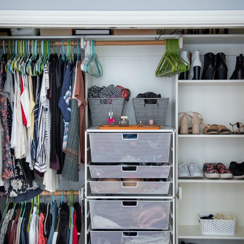 A picture of a professionally organized closet.